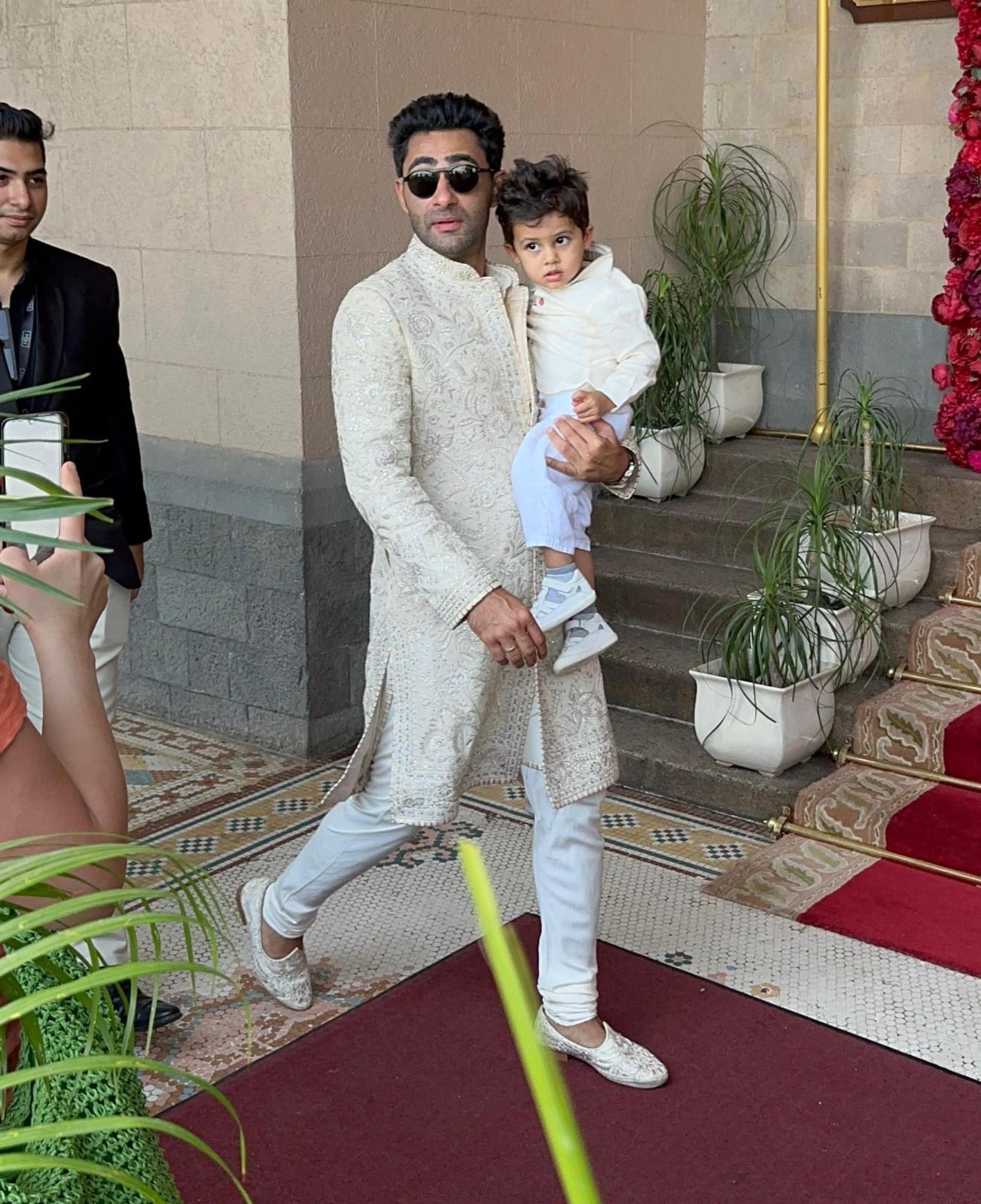  Aadar's elder brother, Armaan Jain, looked busy as he was snapped at the venue