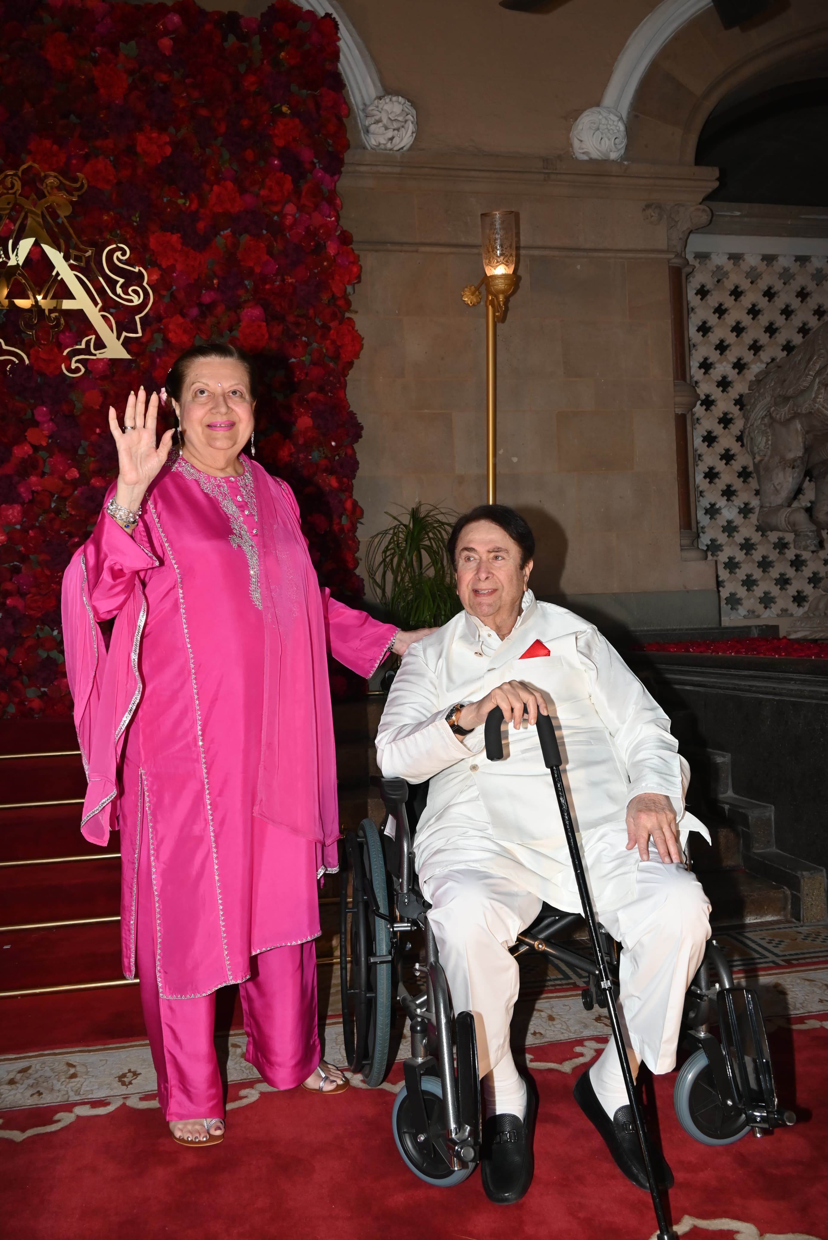 Babita and Randhir Kapoor were all smiles as they posed for the paparazzi stationed at the venue