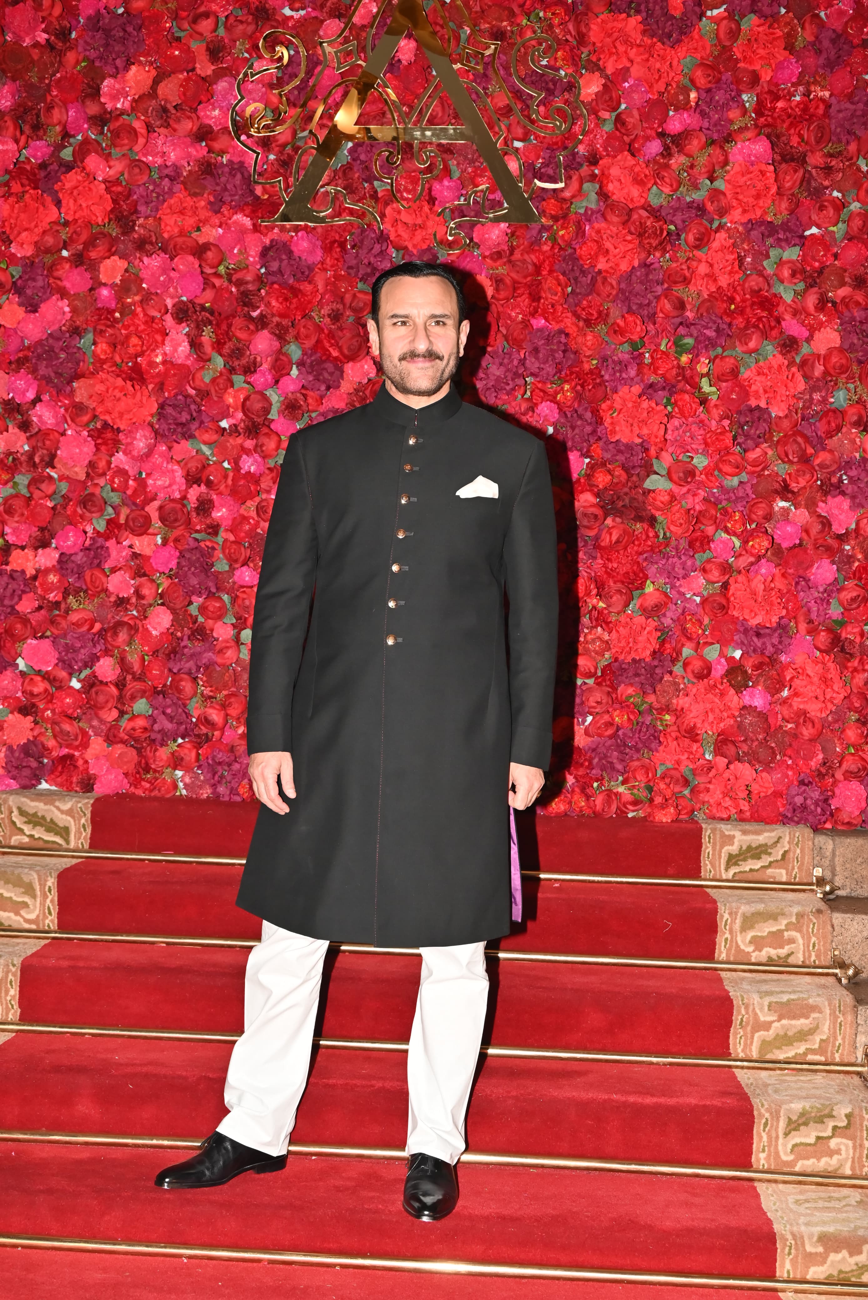 Saif Ali Khan looked dashing as always in a black bandhgala paired with white pyjama