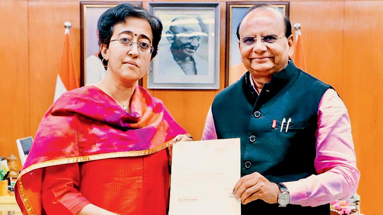 AAP leader and Delhi chief minister Atishi submits her resignation to Lt Governor VK Saxena in New Delhi. pic/pti