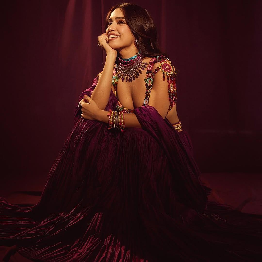 In this look, Bhumi wore a plain purple lehenga paired with a multi-colored floral blouse and matching dupatta