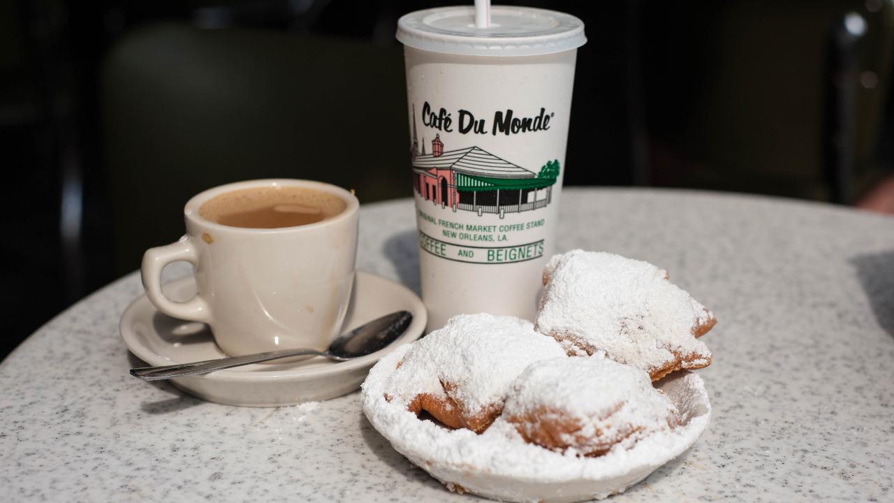 BeignetsBeignets (pronounced ben-YAYs) are fluffy, deep-fried pastries tossed in generous amounts of powdered sugar and a symbol of New Orleans. Beignets are typically served alongside a cafe au lait, and they’re delicious dipped into a vanilla-y crème anglaise; stuffed with warm, melted chocolate; or drizzled in chocolate sauce.