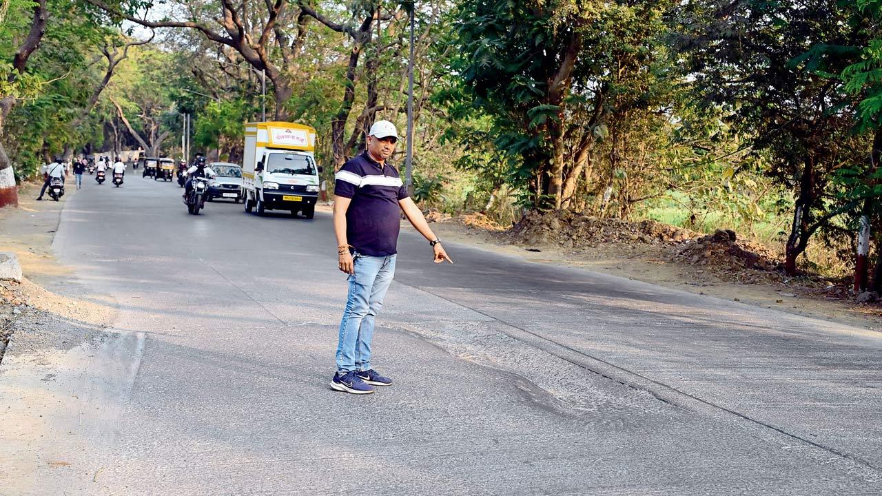 Sandeep Gadhave, Sena (UBT) shakha pramukh, points to the spot where the mishap occurred