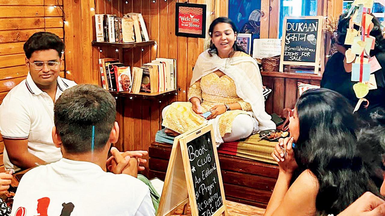 People partake in a conversation. Pics courtesy/Instagram