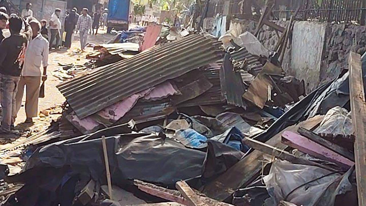 BMC demolishes 43 illegal sheds along Ghatkopar railway station
