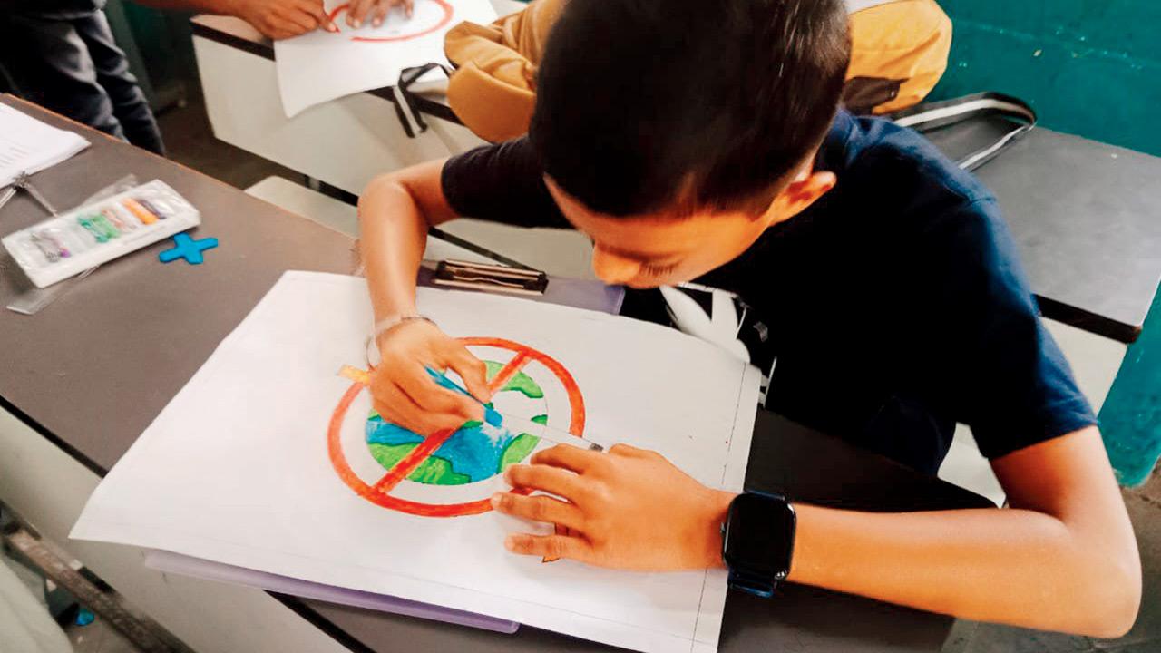 A child draws a sketch as part of the competition 
