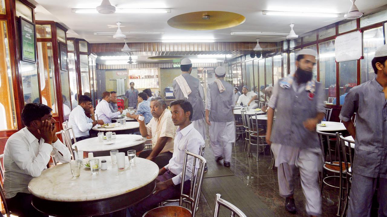 Diners catch up at Olympia Coffee House. Pic/Atul Kamble