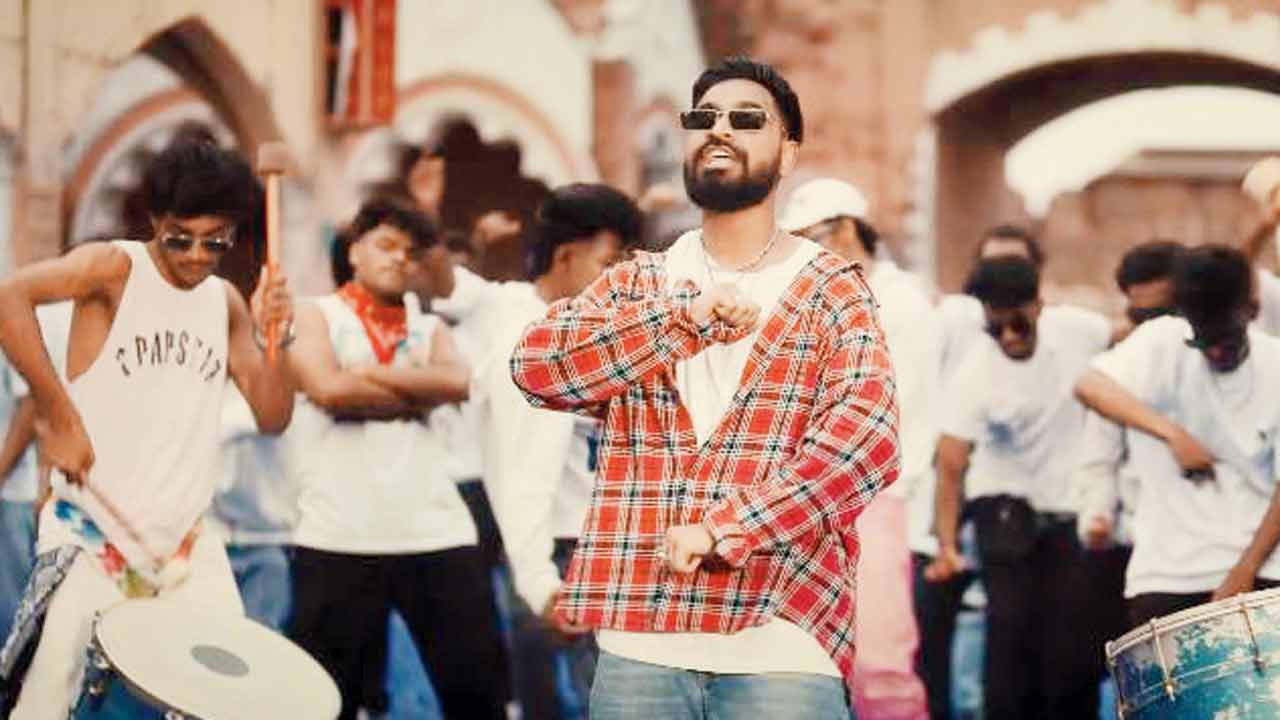 Emiway Bantai (centre) in a still from the recently released music video of the song, Badshah. pic courtesy/youtube