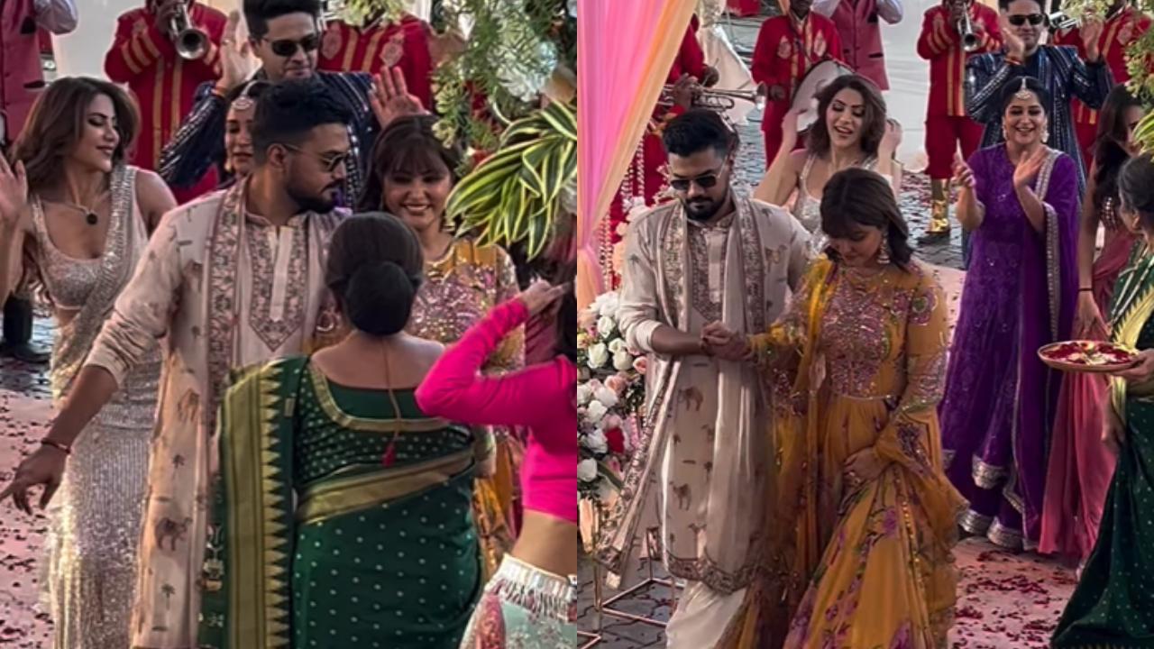 Hina Khan and Rocky Jaiswal receive baraati-style welcome with dhol, aarti & dance Hina Khan and Rocky Jaiswal receive baraati-style welcome with dhol, aarti & dance on Celebrity MasterChef
