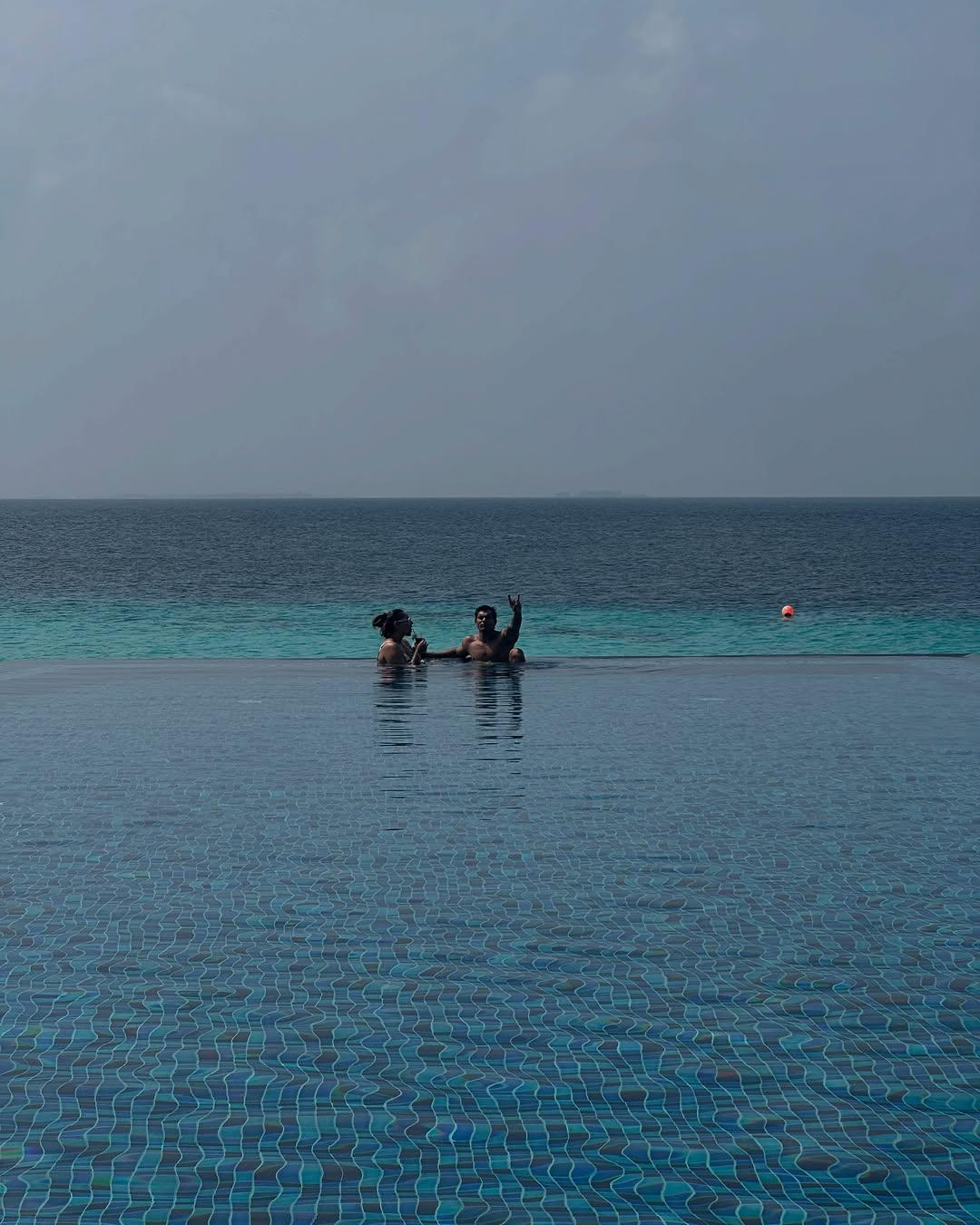 Not only is Karan a perfect dad, but he is also a green-flag husband. In this picture, Karan and Bipasha can be seen enjoying their time in a pool