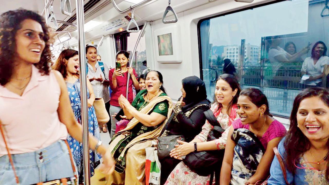 Women enjoy a game of Antakshari on one of the Metro rides 