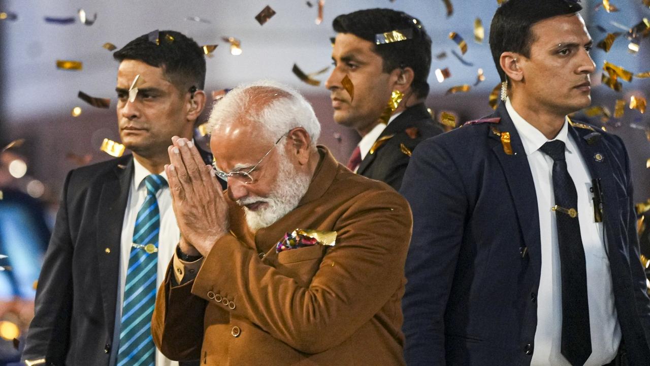 I thank every Delhiite for believing in 'Modi ki guarantee', they backed us whole-heartedly, PM Modi said. Pics/PTI and AFP