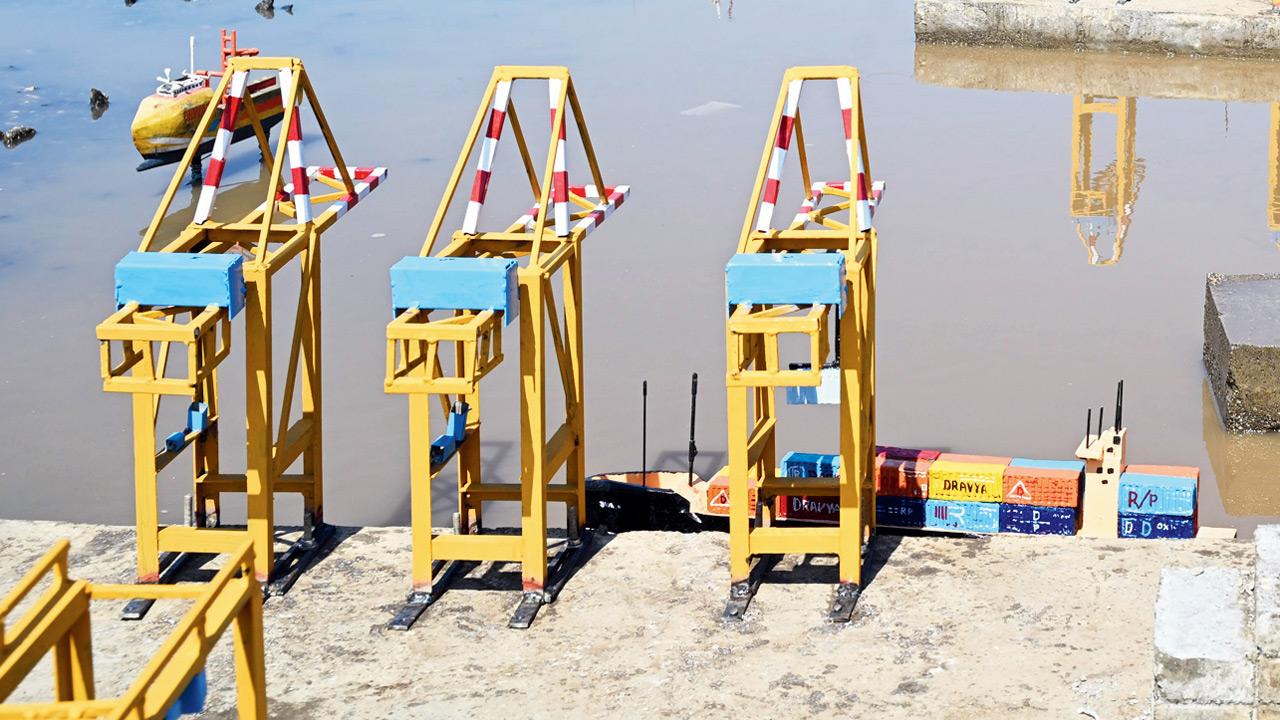Rows of handcrafted metal cranes in the miniature installation
