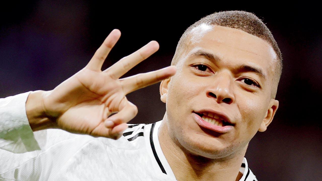 Mbappe celebrates his hat-trick. Pics/Getty Images