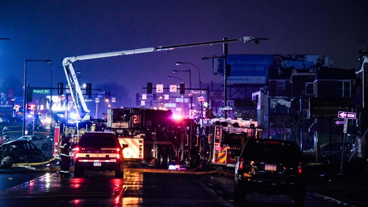 Learjet 55 air ambulance crashes in Philadelphia, triggers residential fires