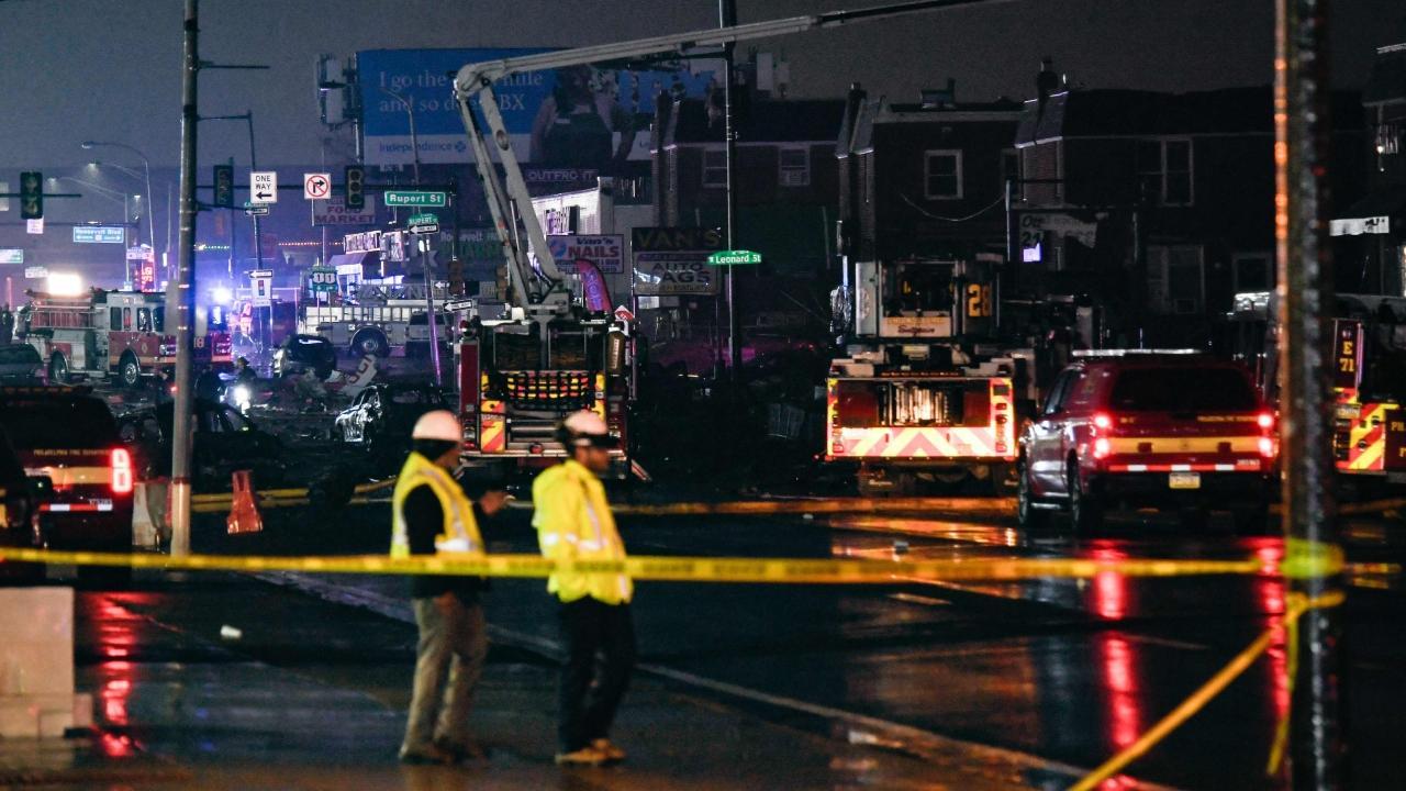 Plane with 6 aboard crashes in Philadelphia, setting homes ablaze, unleashing fireball