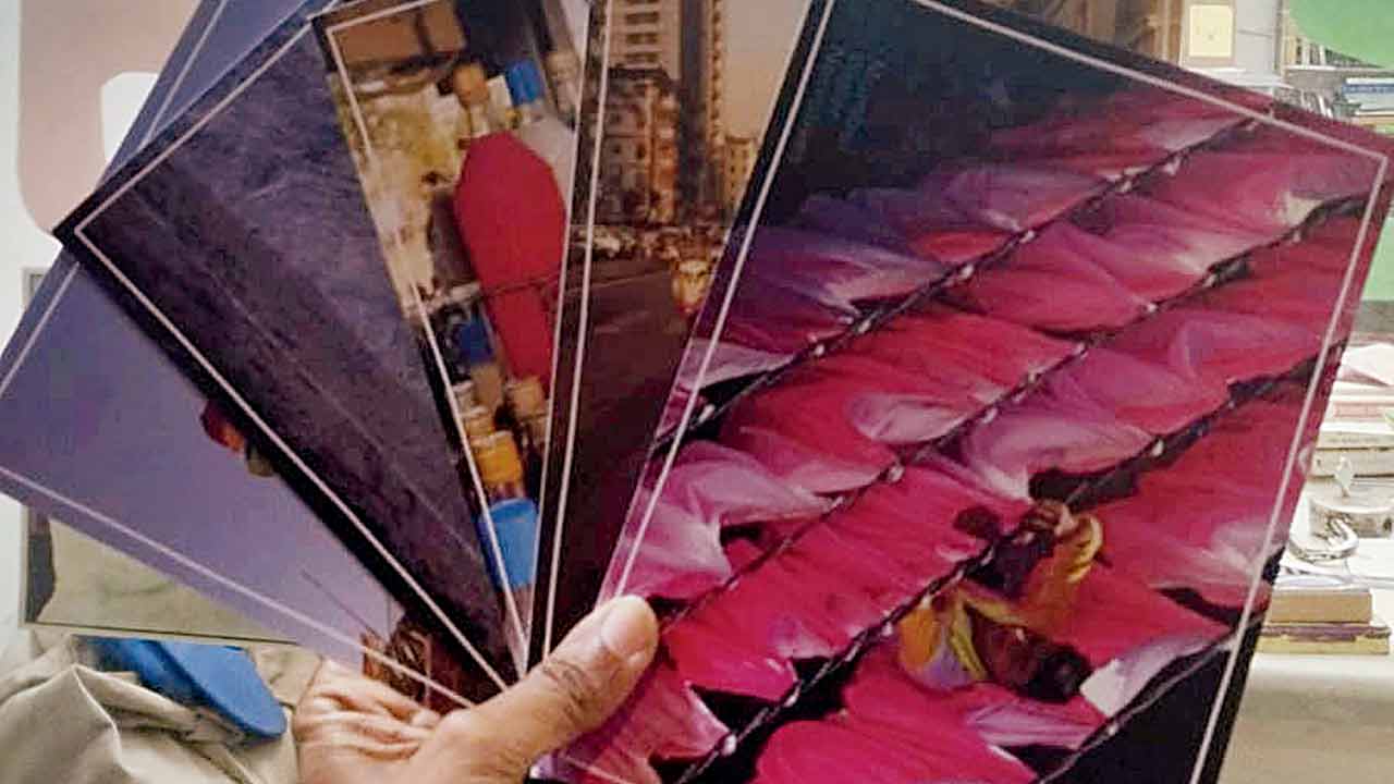 The postcards feature curated photographs and letters 