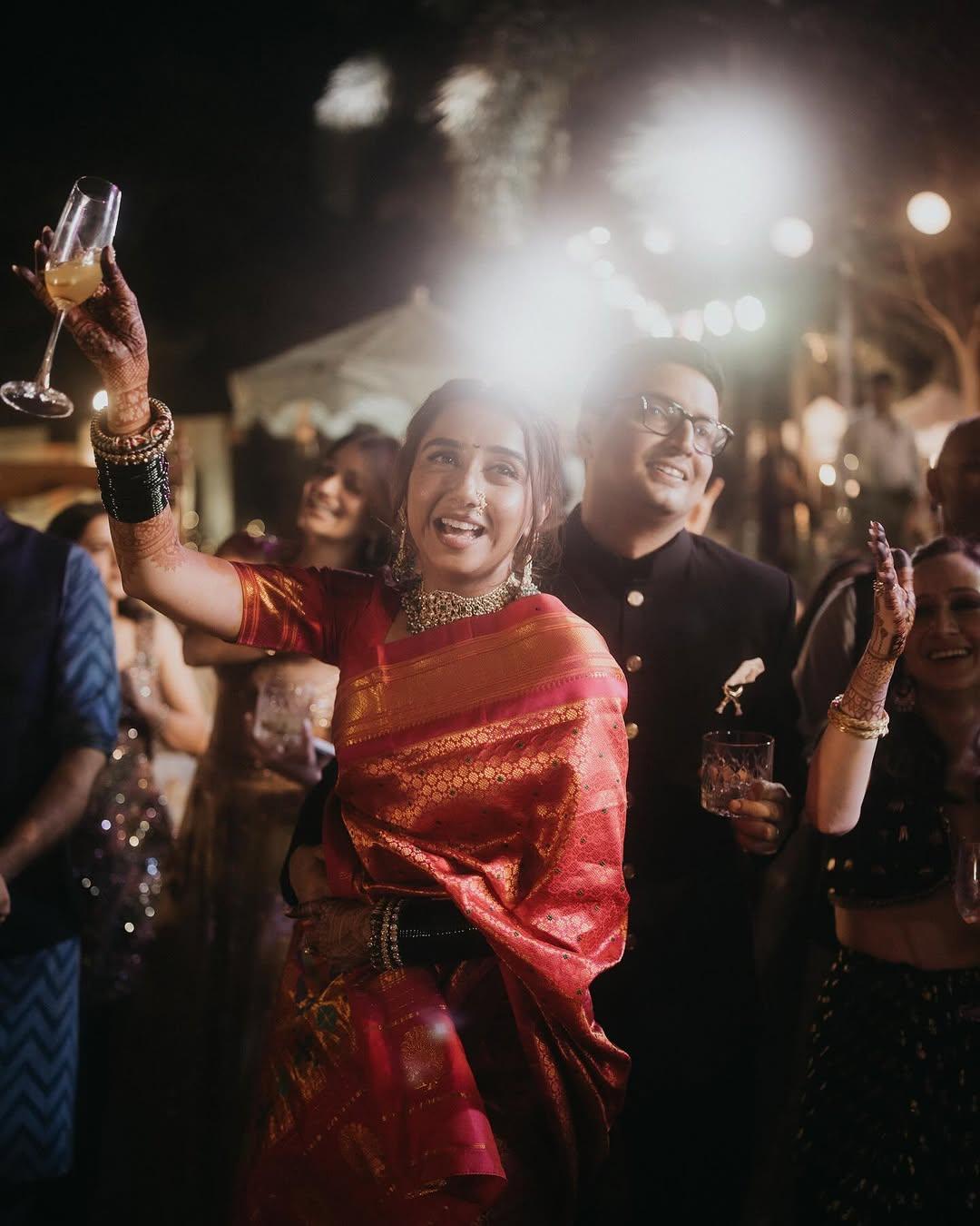 Prajakta Koli and Vrishank Khanal can be seen enjoying a glass of champagne as they prepare to embark on their journey of forever