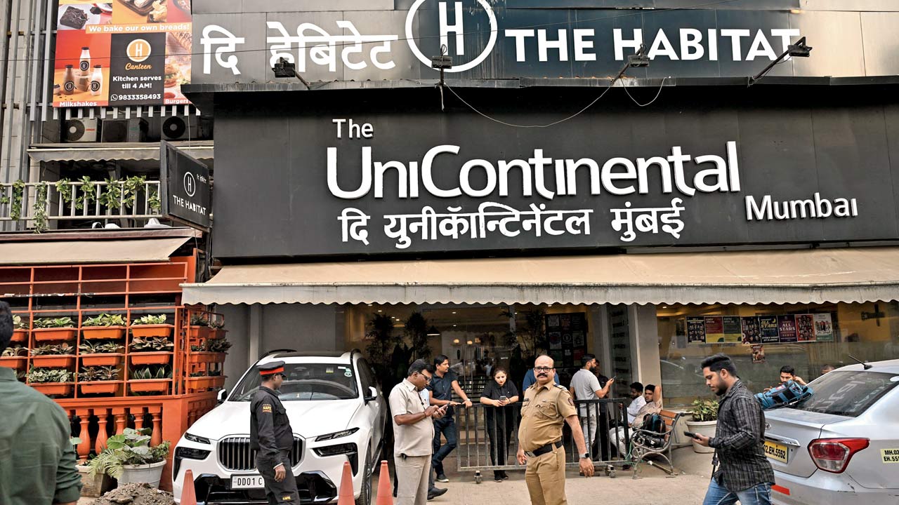Police personnel outside the building that houses the India’s Got Latent studio in Khar on Monday. Pic/Sayyed Sameer Abedi