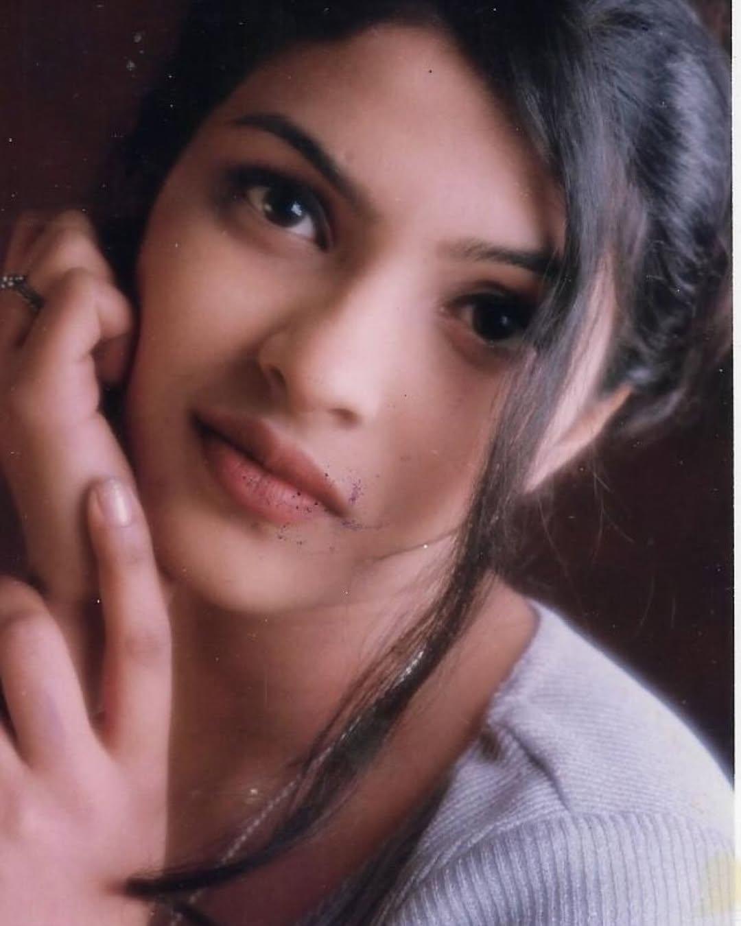 Another picture in the carousel is of her first portfolio shot done in Bareilly in 1999