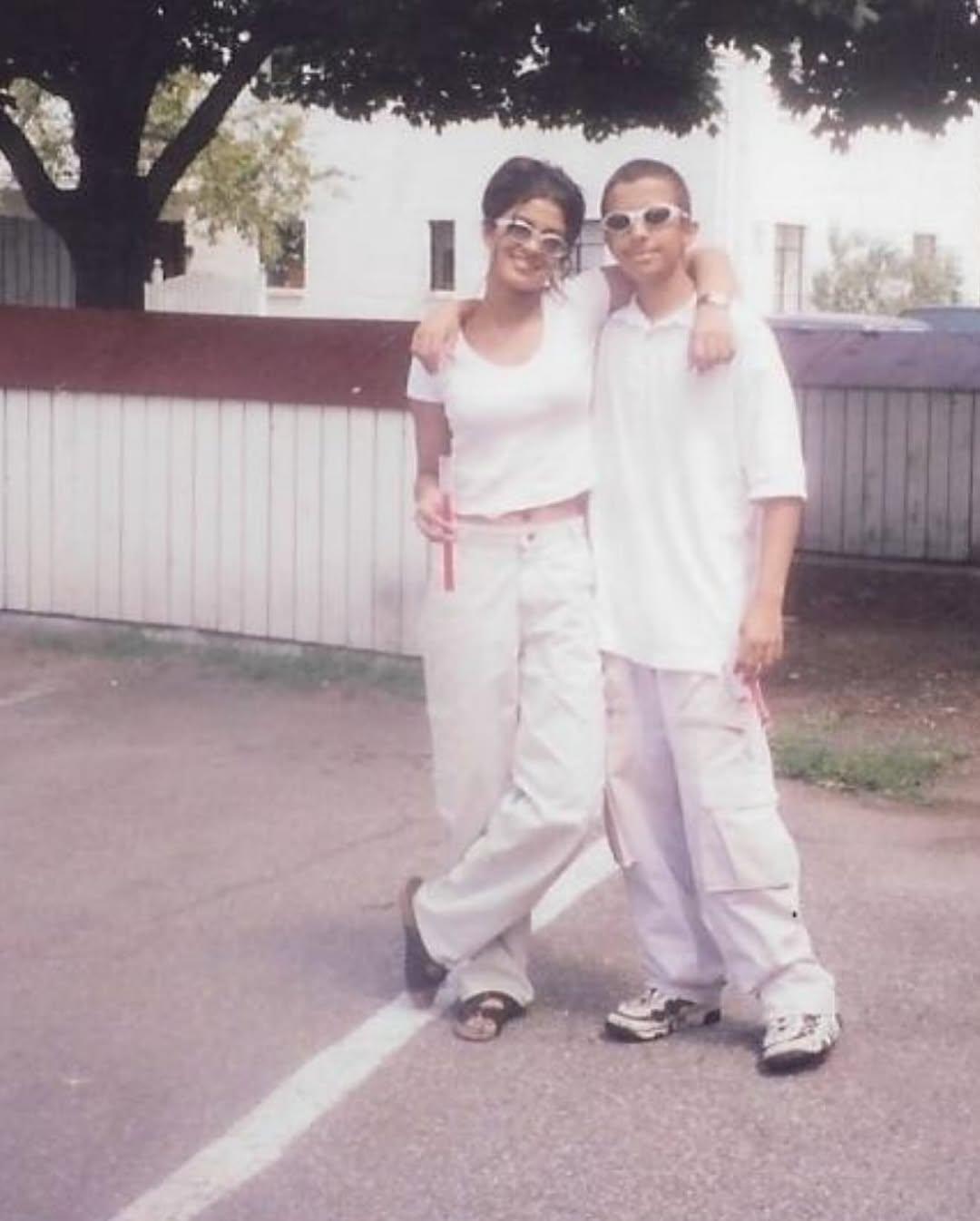 This cute photograph has Priyanka Chopra posing with Irfan Ahmed. Both were seen looking stylish in all-white outfits