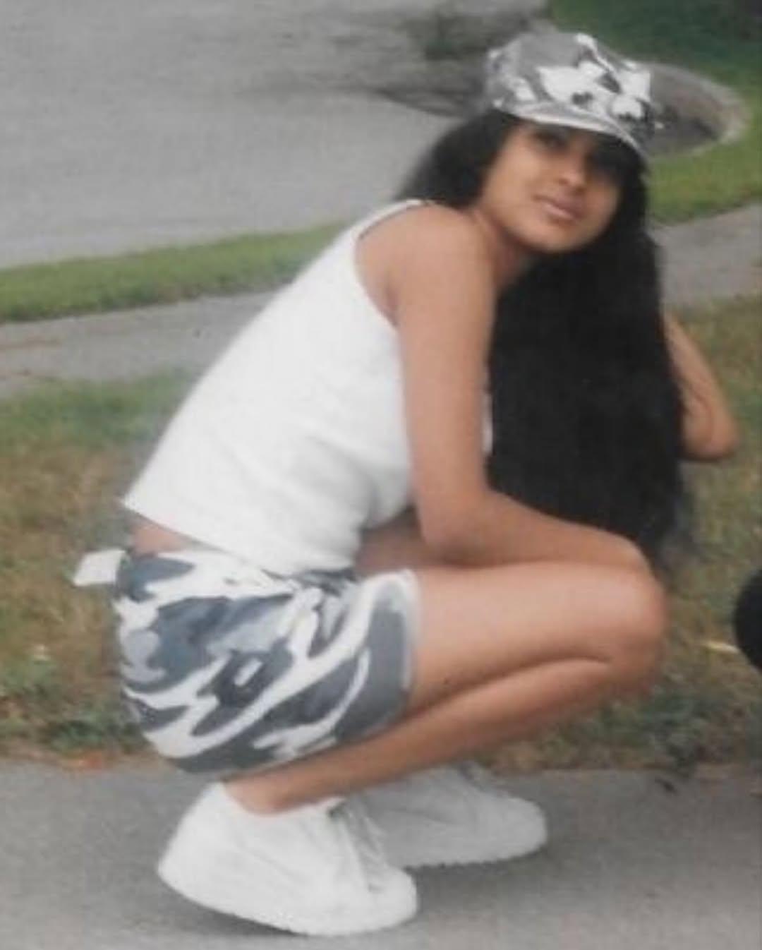 Next in the series was a picture of Priyanka looking cute in black-and-white shorts and a tank top with matching sneakers. The picture was from 1997 when Priyanka was in Boston