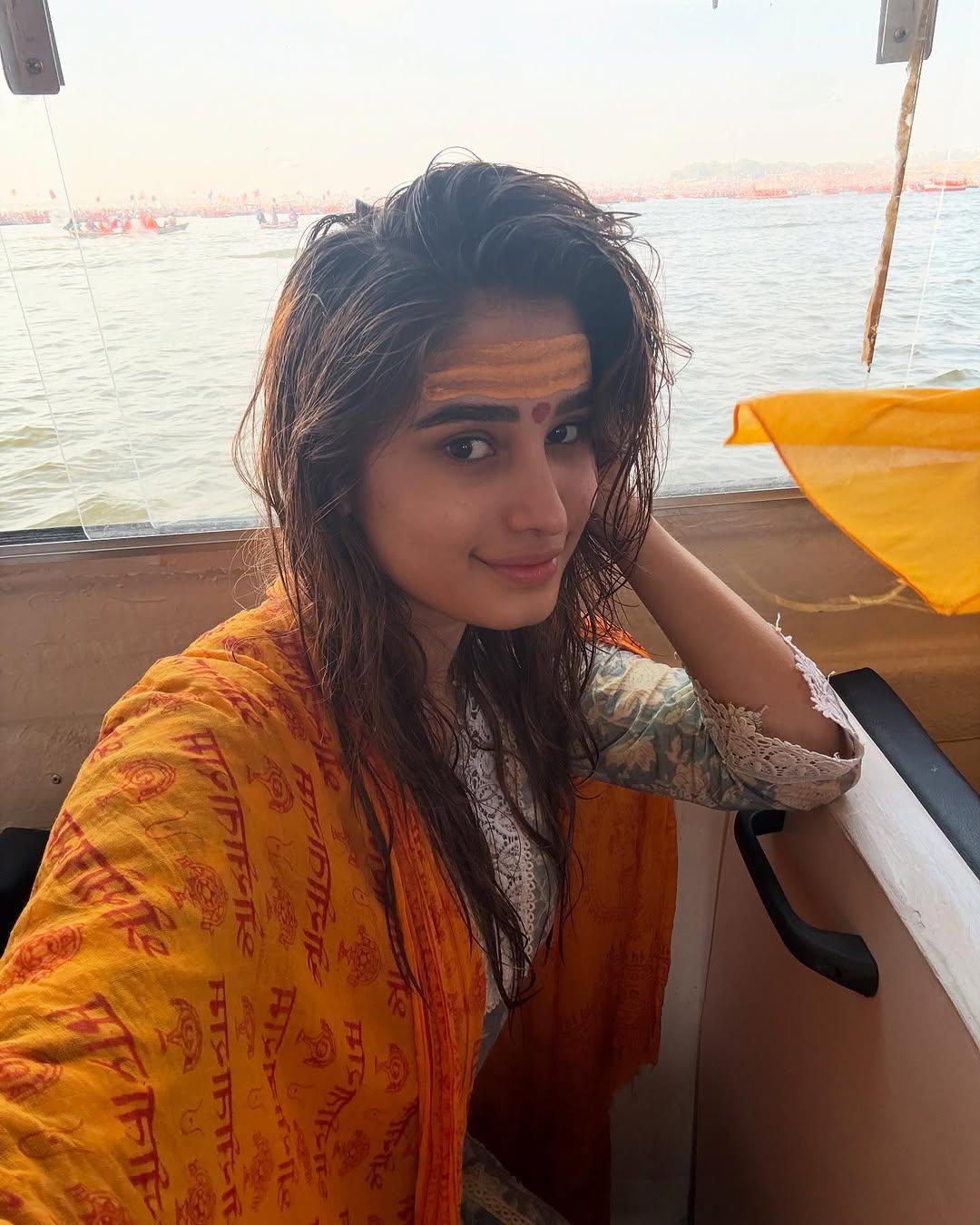 This selfie was taken after Rasha completed her snan in the holy river. The picture has her looking cute with a tika on her forehead