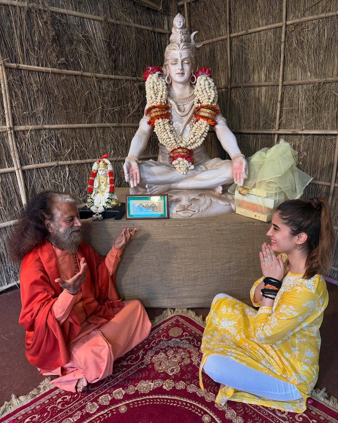 This picture captures Rasha seeking the blessings of Swami Chidanand Saraswati, President of Parmarth Niketan Ashram