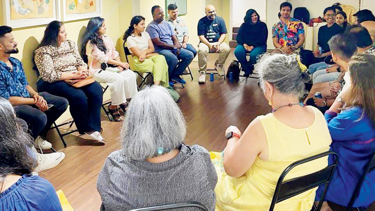 Readers converse during a previous session 