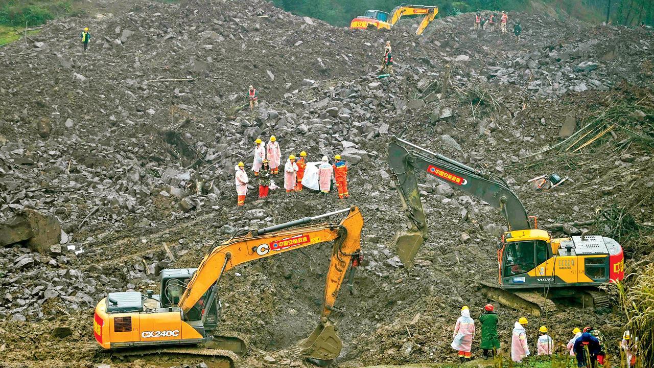 China: Rescuers search for at least 28 after landslide