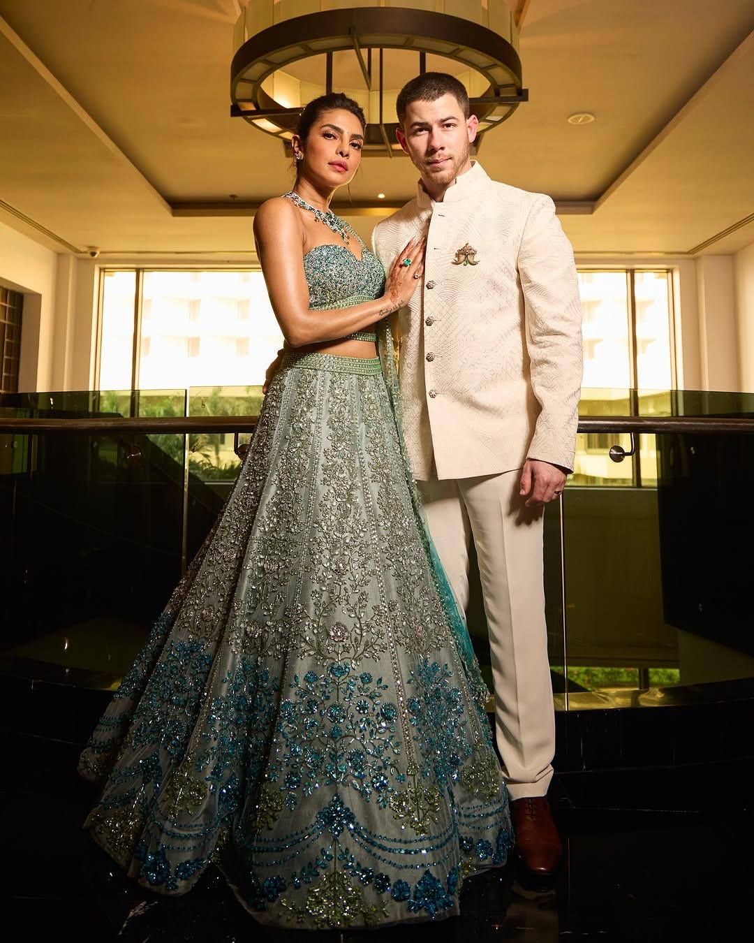 This picture has NickYanka giving major couple goals as they pose together in a stunning shot