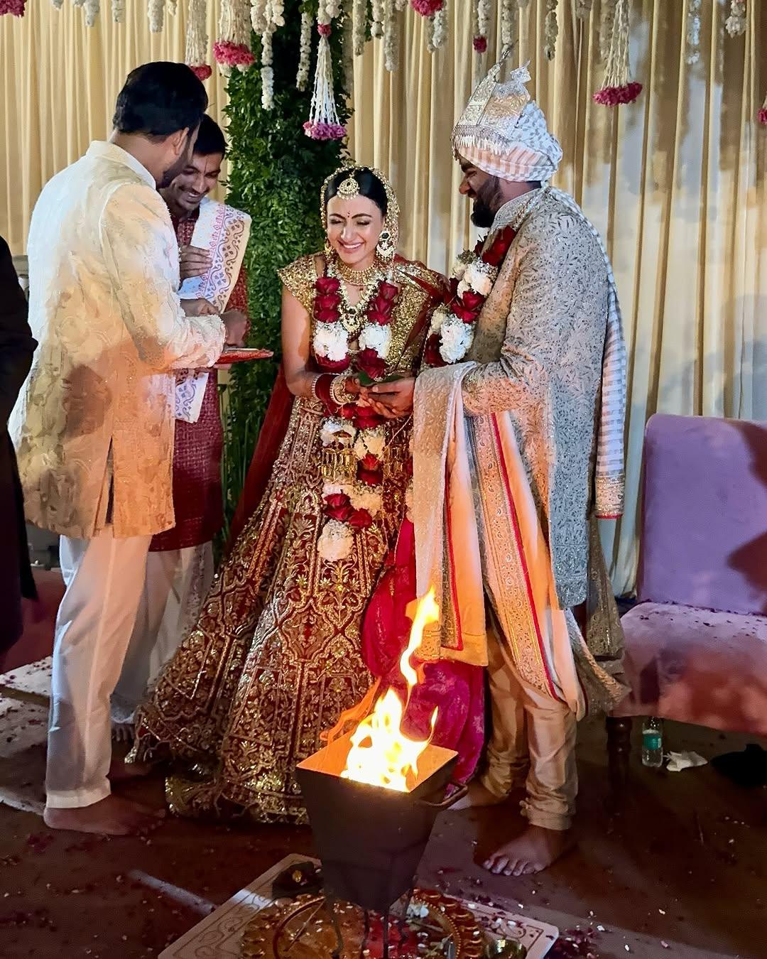 After days of pre-wedding celebrations, Siddharth Chopra and Neelam Upadhyay got married in a traditional ceremony, with varmala and pheras