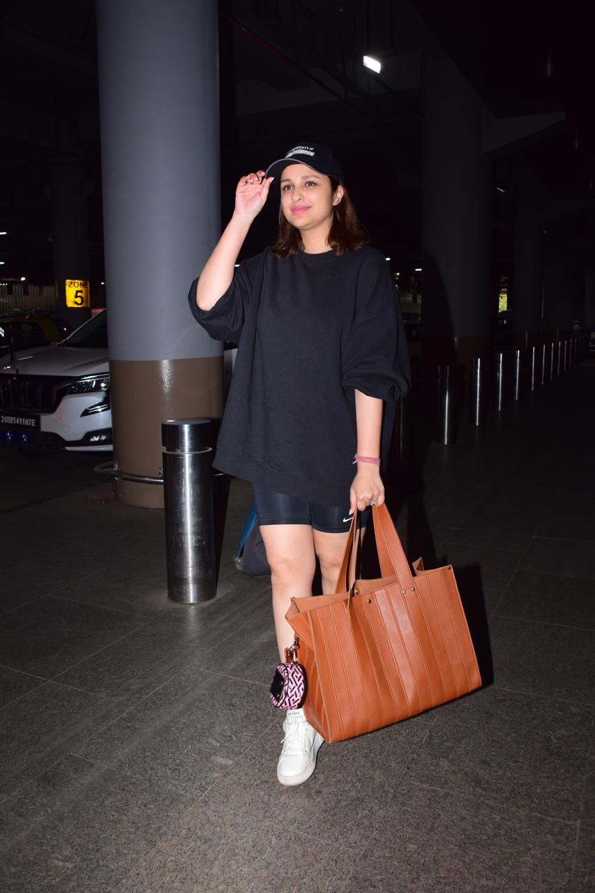 Parineeti Chopra wore an all-black outfit for her airport look.