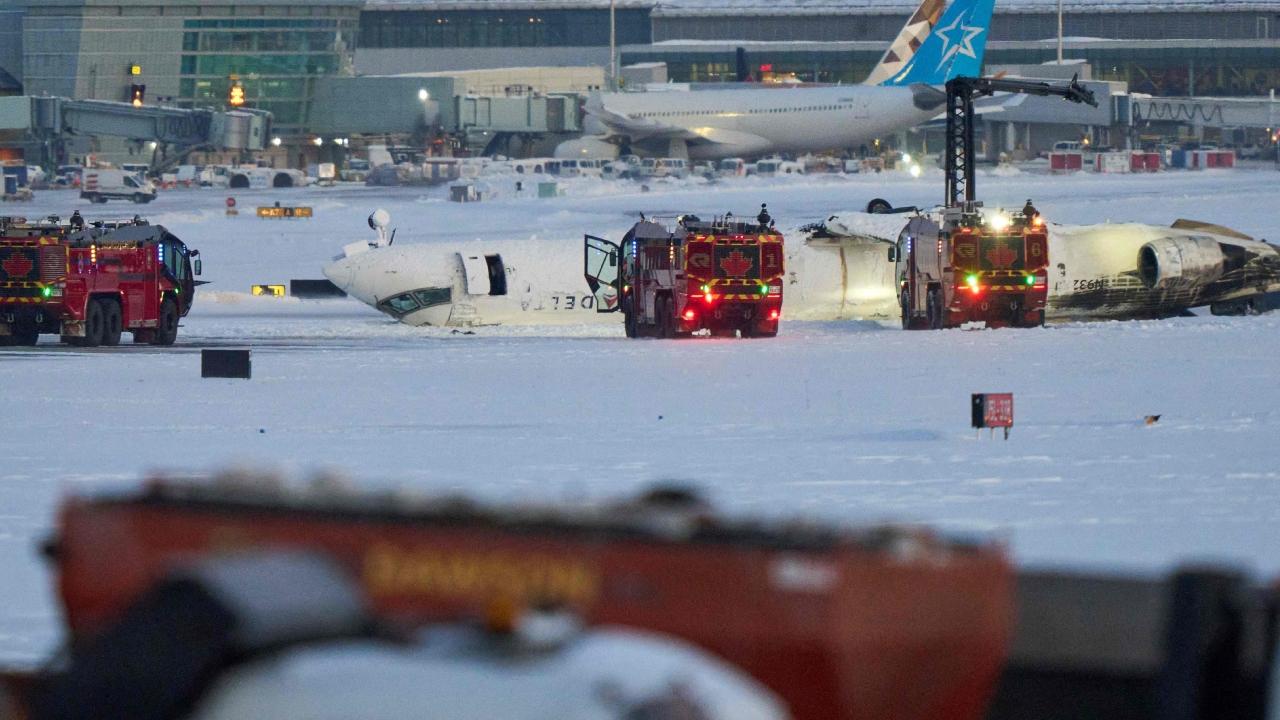 Snow was being blown by winds gusting to 40 mph (65 kph) when the flight from Minneapolis carrying 76 passengers and four crew attempted to land on a dry runway at around 2:15 pm. Authorities said the cause of the crash remained under investigation