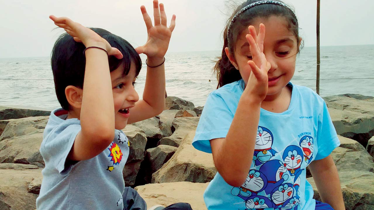 Exploring on the rocks at Marine Drive