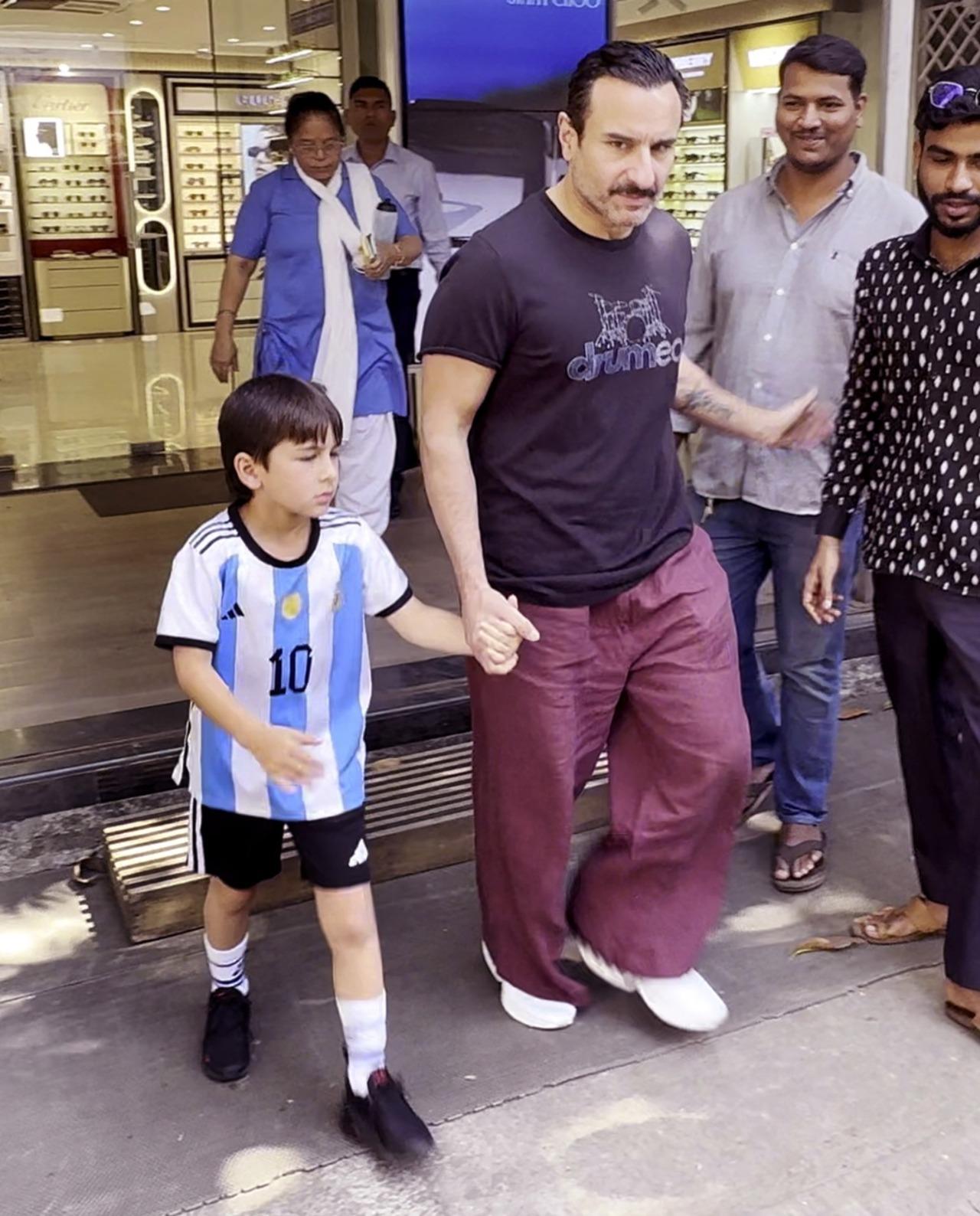 Saif Ali Khan stepped out with son Taimur, who was probably playing football earlier. 