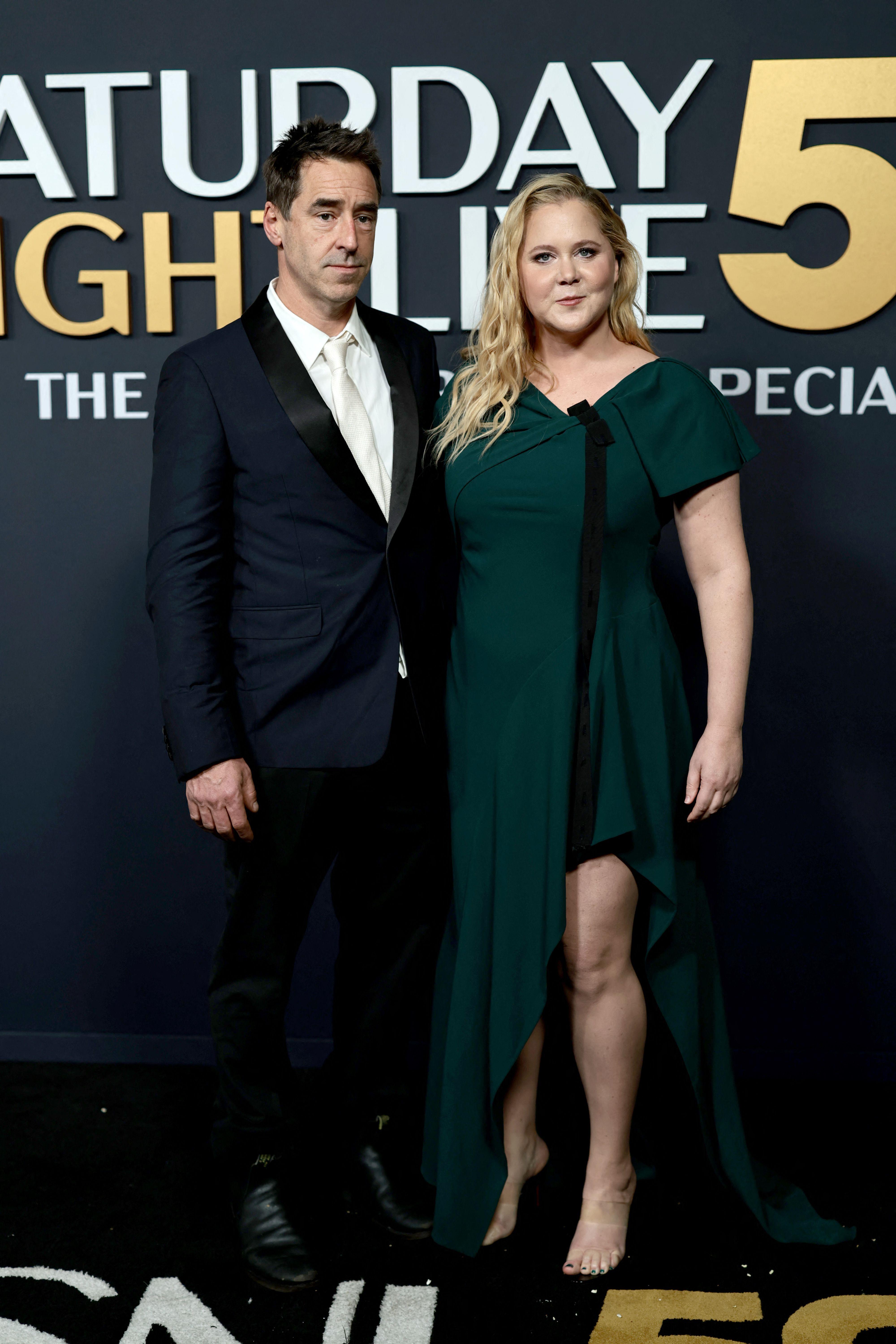 Chris Fischer and Amy Schumer attend SNL50: The Anniversary Special on February 16, 2025 in New York City