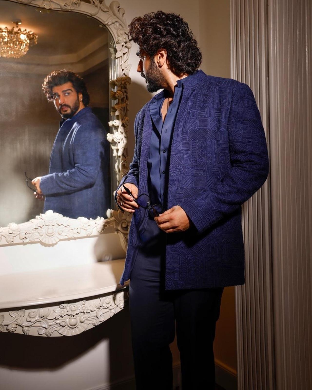 The coat has exceptional thread work and gives one a classy vibe. He completed the look with a simple chain, ring and sunglasses