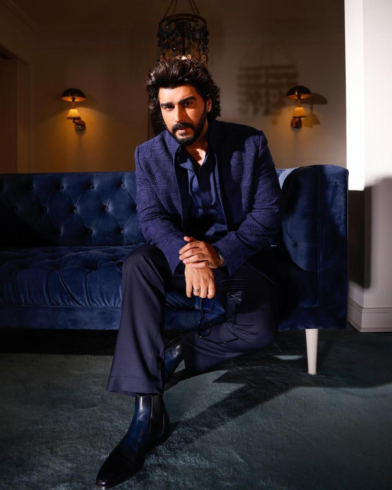 Arjun looks effortlessly stylish in a blue custom suit by Nafs