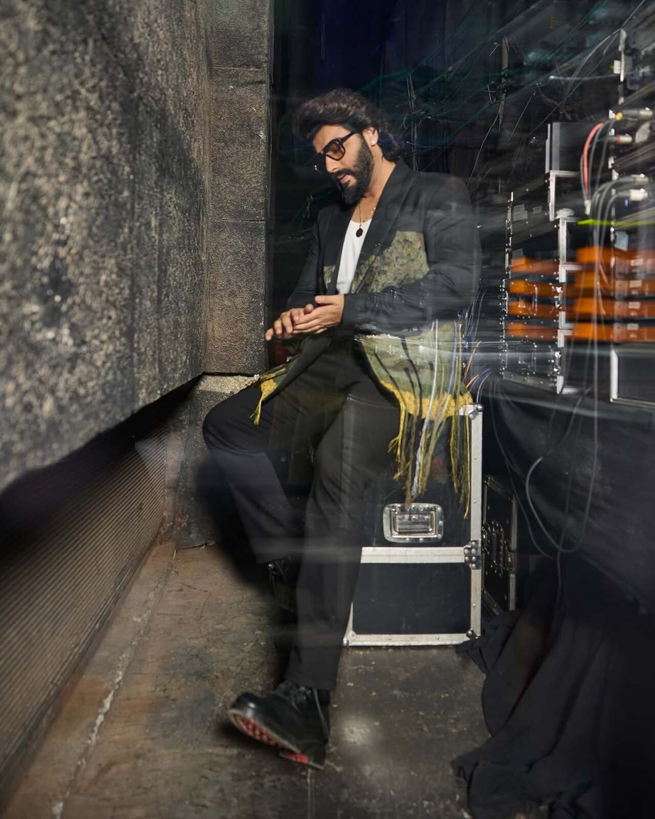 The stylish blazer is by Huemn. The actor's well-kept long beard and hair only add to the gravitas of the look