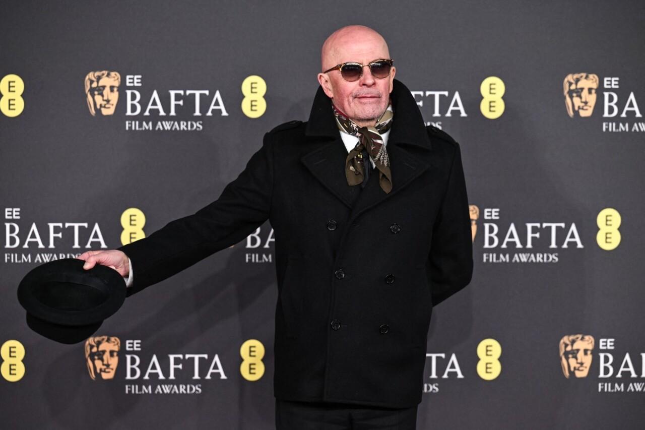 Film director Jacques Audiard poses in style on the red carpet