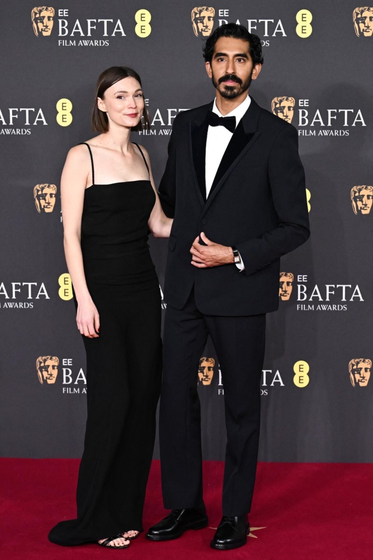 Actor and director Dev Patel looked smart in a black suit. His debut directorial Monkey Man was nominated for BAFTA