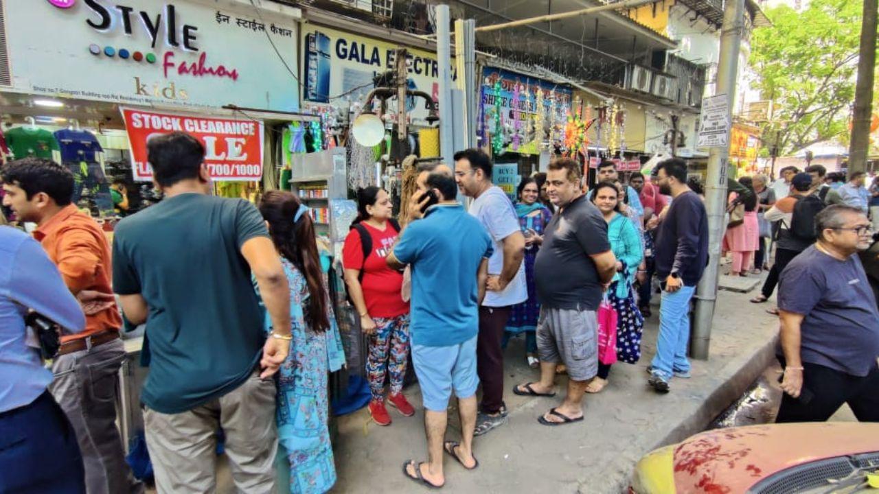 Customers outside the bank's Kandivali west branch looked stressed and confused about when they will recieve their money back