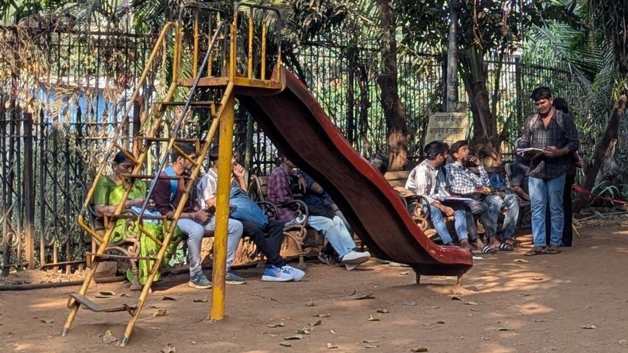 The Mumbai Police have issued stringent orders to prevent any form of cheating during the exams, particularly concerning electronic devices.
(In Pic: students sitting in the garden reading notes before the exams opposite the Patuck Technical Junior College at Santacruz East which is a sensitive centres as per HSC board list. Pic/Ranjeet Jadhav)