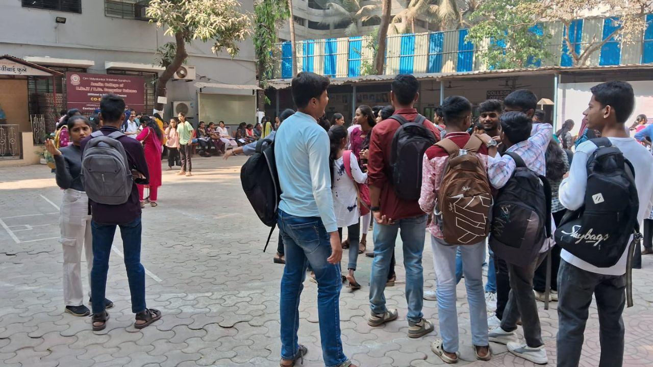 The use of mobile phones, laptops, Bluetooth devices and the internet is strictly prohibited inside and near examination centres
(In Pic: Students wait outside Asmita College in Kannamwar Nagar, Vikhroli East ahead of board exams. Pic/Sameer Surve)