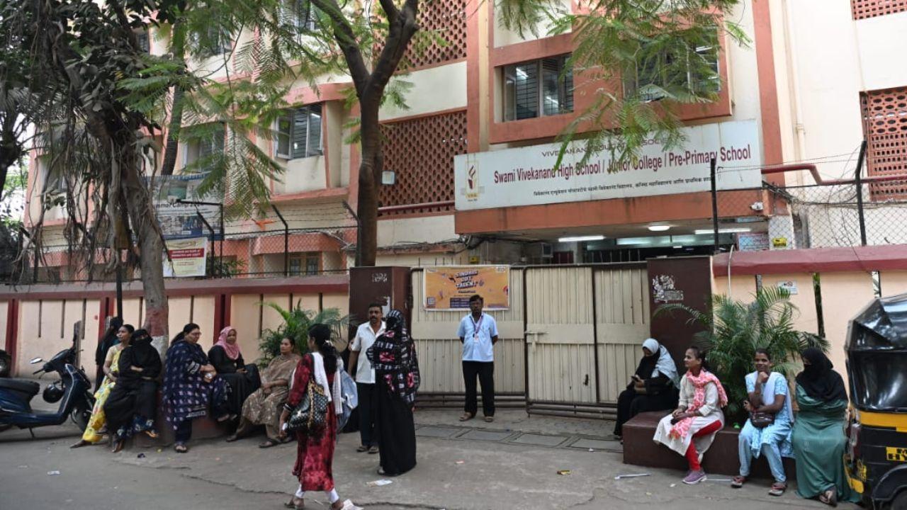 These individuals will be required to carry official identification cards issued specifically for the exams
(In Pic: Parents wait outside Swami vivekanand high school and  junior college in Chembur as the students write their board exam. Pic/ Sameer Abedi)