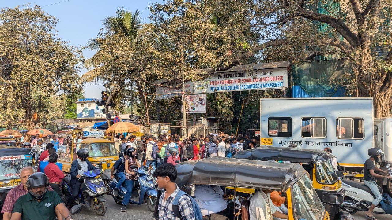 Sensitive exam centres will be under drone surveillance, and video monitoring will be conducted outside examination venues to ensure compliance with strict guidelines
(In Pic: Students and parents outside Patuck Technical Junior College at Santacruz East which is a sensitive centres as per HSC board list. Pic/Ranjeet Jadhav)