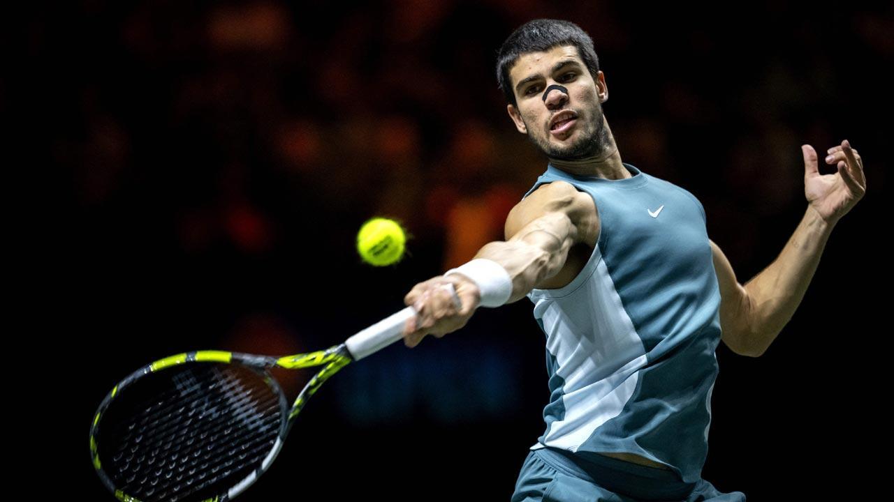 Carlos Alcaraz battles into Rotterdam final date with Alex De Minaur