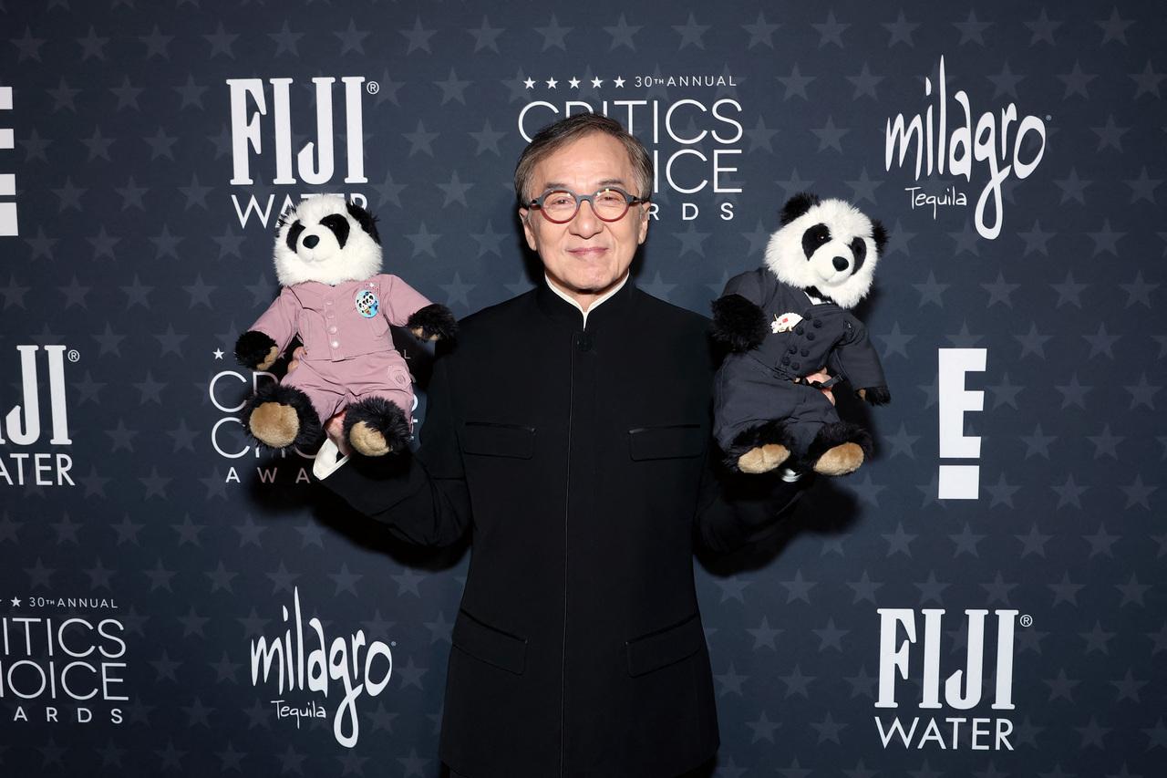 Legendary actor Jackie Chan made an adorable appearance as he posed with panda soft toys