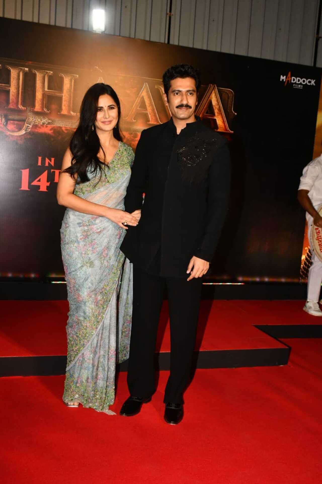 Katrina Kaif looked stunning in an ice blue saree as she walked hand-in-hand with Vicky Kaushal for the screening